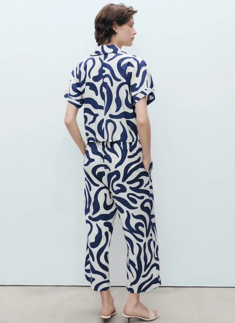 مانجو بلوزة قصيرة مطبوعة بفيونكة